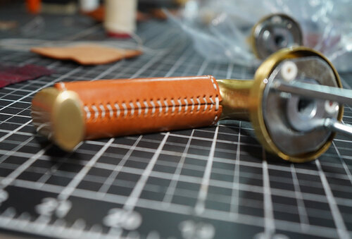 Inside of the leather wrapped door handle with finished stitching