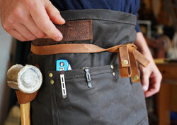 Half-size apron with hammer loop and pockets for tools