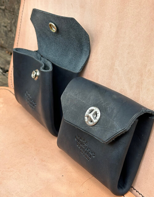 Katrina leather pouch with peace sign snap