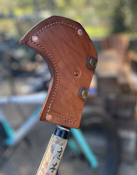 Custom leather sheath for a sickle