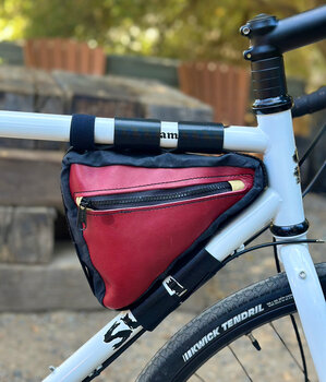 Leather small triangle frame bag to carry your essentials