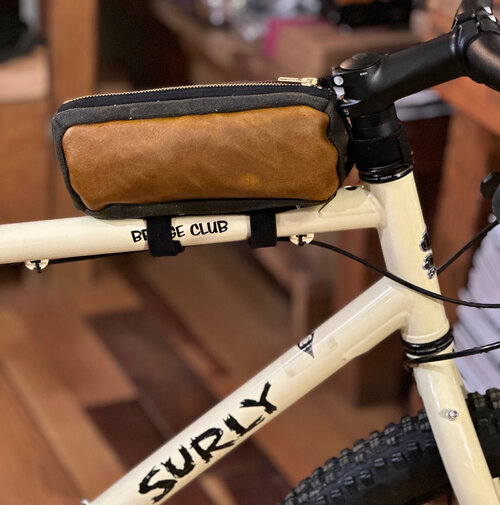 Bicycle top tube bag made with canvas and leather to carry small items